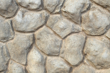 decorative border of the building facade made of concrete in the form of large stones