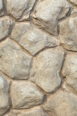 decorative border of the building facade made of concrete in the form of large stones