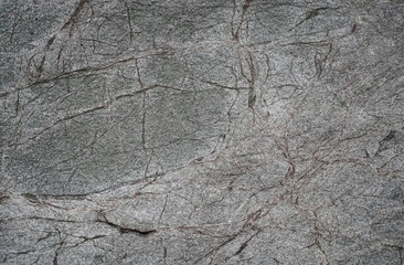 floor and wall gray coverings in the form of natural stone, marble for facing, landscape, interior.