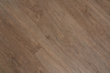 Fototapeta premium New parquet. Oak Wooden laminate floor boards background image.