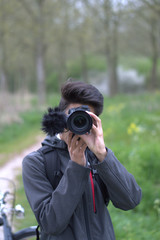 young man taking pictures