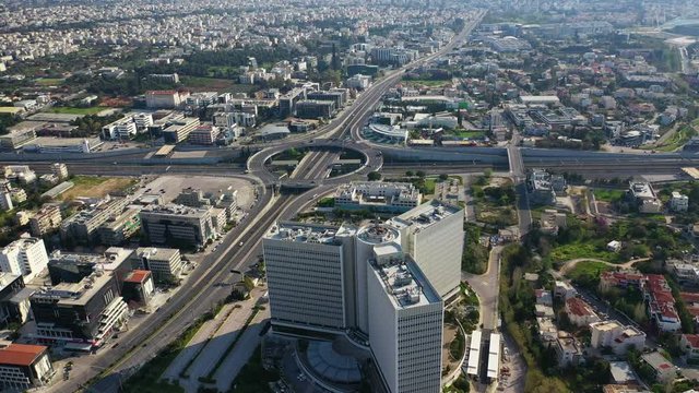 Aerial drone video of ring road in Kifisias and Attiki odos avenues, a popular multilevel junction circular road, Attica, Greece