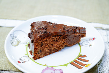 chocolate cake. Delicious chocolate cake in white plate, close-up
