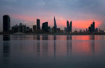 Fototapeta na wymiar Beautiful sky and reflection of Bahrain skyline at sunset