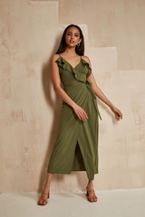 Fashion model brunette hair wear green silk dress sandals high heels accessory bag clothes for date...