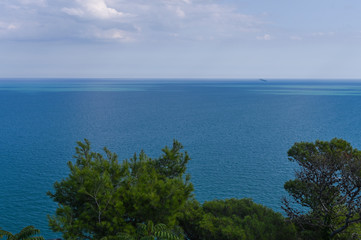 Fototapeta na wymiar National park in Italy. Rimini. Sea view from the mountains with beautiful panorama and blue sky.