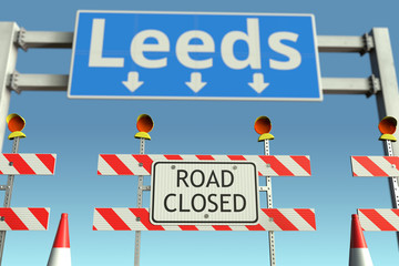 Barriers at Leeds city traffic sign. Quarantine or lockdown in the United Kingdom conceptual 3D rendering