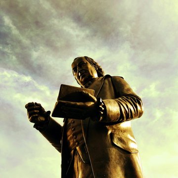 Low Angle View Of John Morris Statue Against Sky