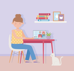 meeting online, woman working laptop in desk with cat in home