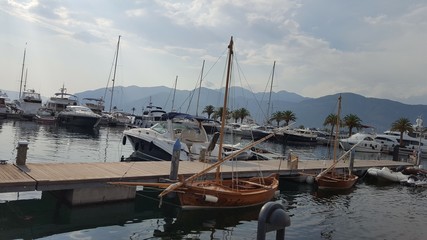 Fototapeta premium boat, sea, water, harbor, marina, yacht, boats, ship, sky, port, ocean, sailboat, harbour, sailing, blue, dock, yachts, sail, summer, travel, lake, bay, fishing, barcelona, vessel, Paradise, heaven, 