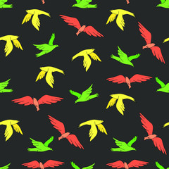 Yellow, green and red flying birds on dark-grey background: colorful seamless pattern, wallpaper design, textile print. Vector graphics.