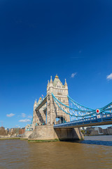 A view of the Tower Bridge during a sunny and clear day.