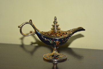 Fototapeta na wymiar Aladin lamp on table