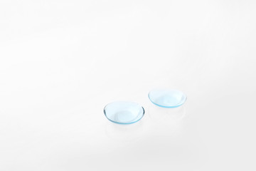 Contact lenses on white background