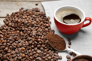 Tasty coffee with cup of hot beverage on table