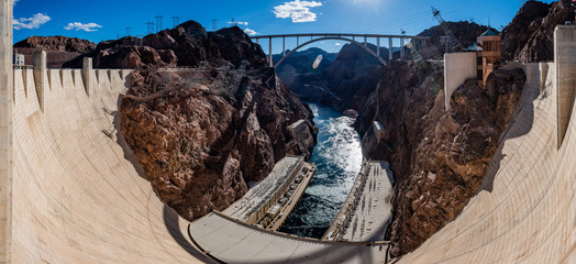 Panoramic picture of Hoover Dam and Mike O'Callaghan - Pat Tillman Memorial Bridge connecting Arizona and Nevada over Colorado River, USA