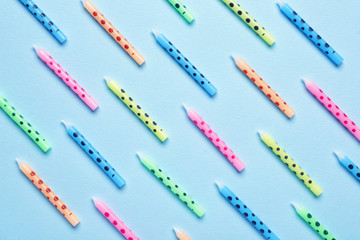 Birthday candles on color background
