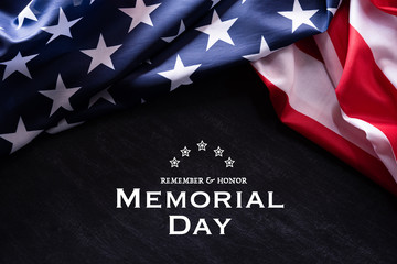 Happy Memorial Day. American flags with the text REMEMBER & HONOR against a blackboard background. May 25.