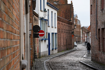 Street scene, historic brick houses and the famous bridge-like structure. © Marcin