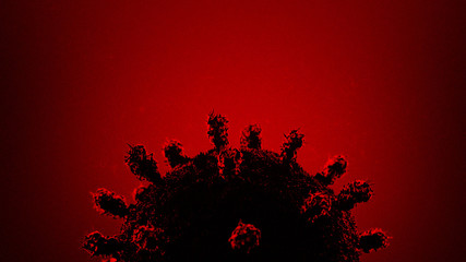 COVID-19 coronavirus shown in dramatic red lighting.