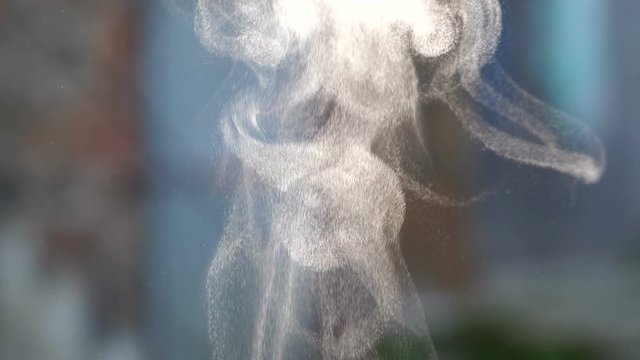Water steam particles background super slow motion.
Steam in a mesmerizing super slow motion. 
Suspended steam water particles.
