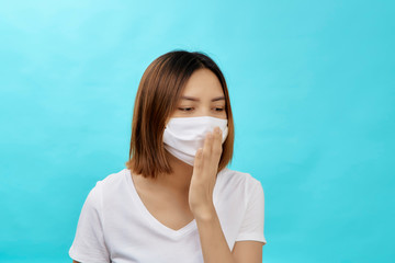 Brunette woman wearing face mask