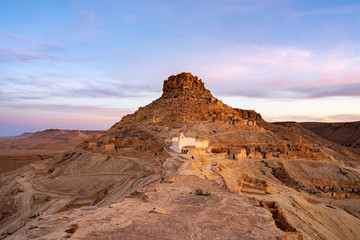 Fototapeta na wymiar red rocks in the desert old town germassa