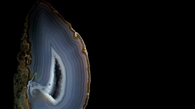 raw agate mineral on a black background