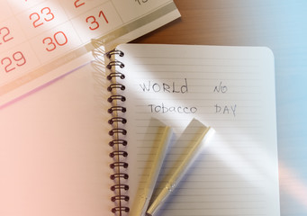 No Smoking, anti-tobacco, world no Smoking day, top view of cigarettes, Notepad, calendar, quit Smoking concept