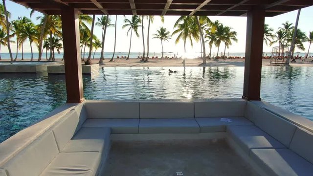 Paradise dream in tropical resort, infinity pool and luxury beach resort in Caribbean sea, exotic tourist resort with deckchairs and lounge are, idillyc hotel in Dominican Republic