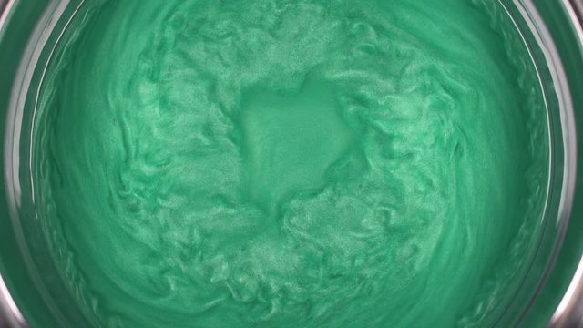 Rheoscopic fluid. Beautiful movement of particles in a liquid. Fantastic patterns and shapes. 50 fps
