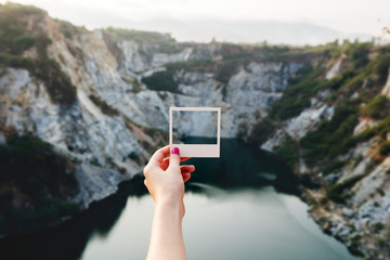 Instant film frame with nature on a background
