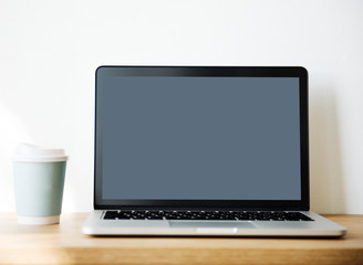 Fototapeta premium Mockup computer laptop on wooden table