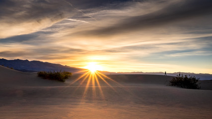 Fototapeta na wymiar Sunrise beautiful sand dunes death valley mesquite sand dunes