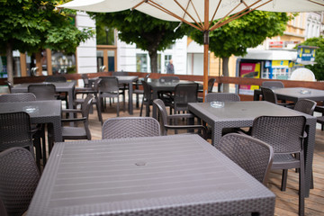 restaurant on the street without people. The interior of a summer restaurant without people. Covid-19