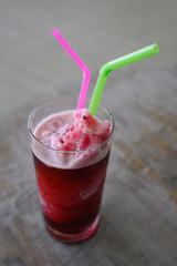 Roselle juice smoothie on wooden table