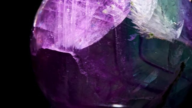 Macro mineral stone Fluorite crystal on a black background close-up