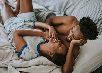 Obraz na płótnie Canvas Black couple in bed