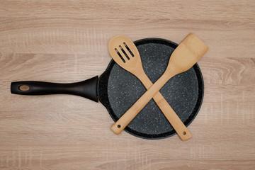 pancake pan, wooden spoon and spatula, kitchen, wood, isolated, dishes, cooking pancakes, table