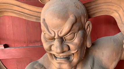 in Japanese Buddhism, a pair of guardian Deva kings called 'Nio'