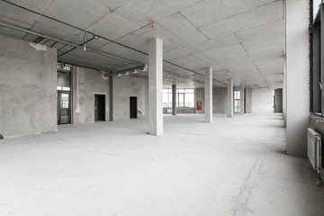 empty pure commercial office building undecorated in gray colors.open space office