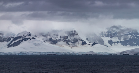 Antarctic landscape with mountains and glaciers