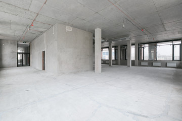 empty pure commercial office building undecorated in gray colors.open space office
