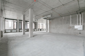 empty pure commercial office building undecorated in gray colors.open space office