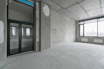 empty pure commercial office building undecorated in gray colors.open space office