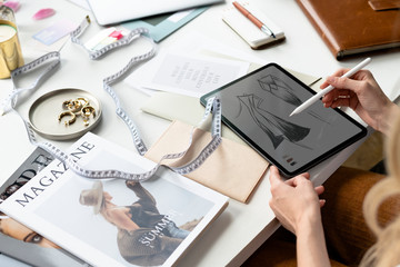 Designer drawing on a tablet