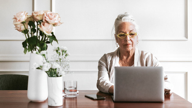 Senior Woman Working On A Laptop