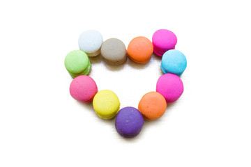 colorful macaron in heart shape isolated on white background