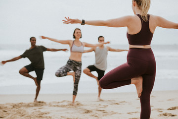 Yoga class by the beach