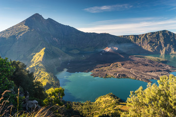 Naklejka na ściany i meble Rinjani active volcano mountain view from Sembalun crater in a morning sunrise, Lombok island in Indonesia
